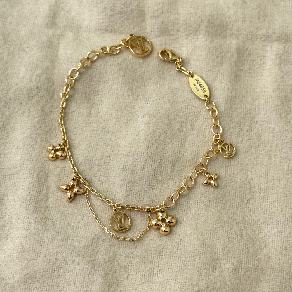 Louis Vuitton Gold Charm Bracelet with Floral Motifs